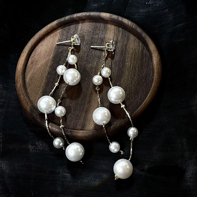 科技與時(shí)尚完美融合，最新長(zhǎng)款珍珠耳飾款式亮相！